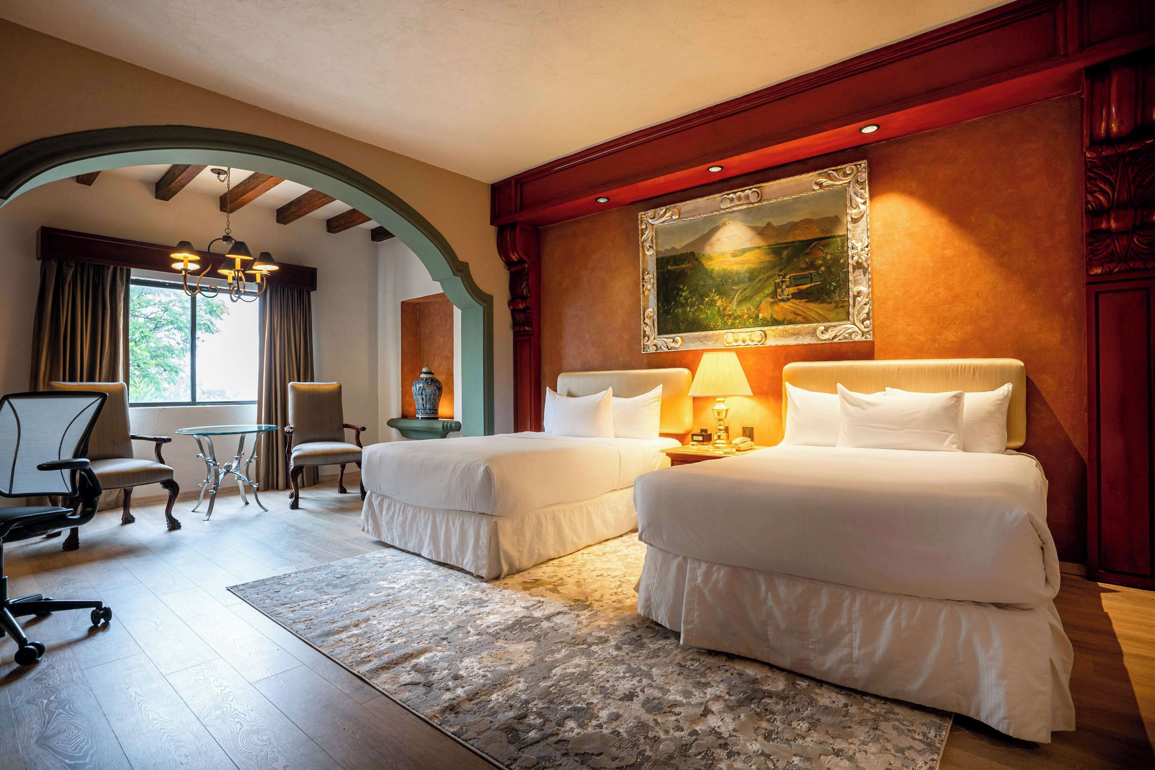 room, 2 double beds | premium bedding, in-room safe, individually decorated, blackout curtains