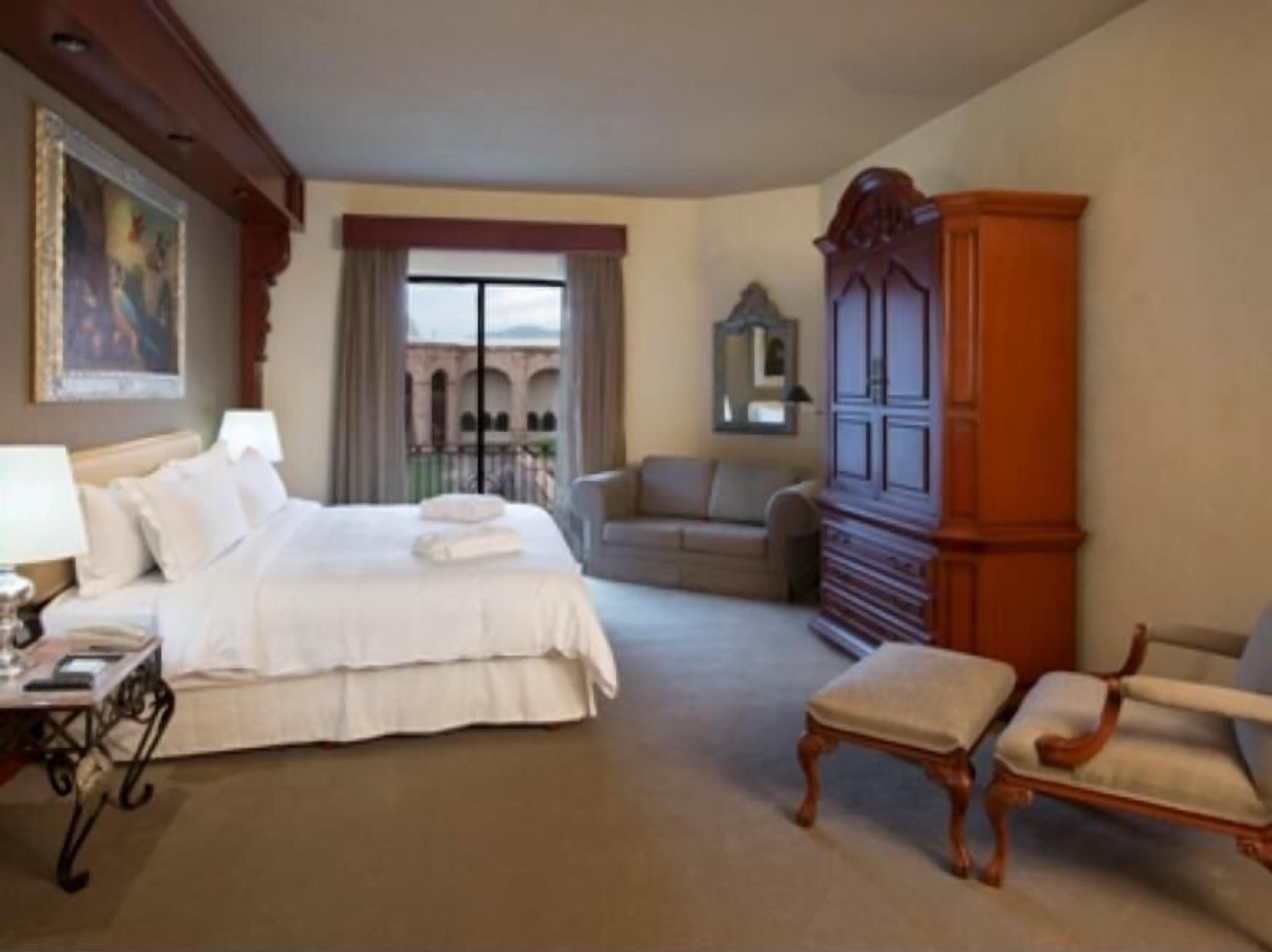 Premium bedding, in-room safe, individually decorated, blackout curtains