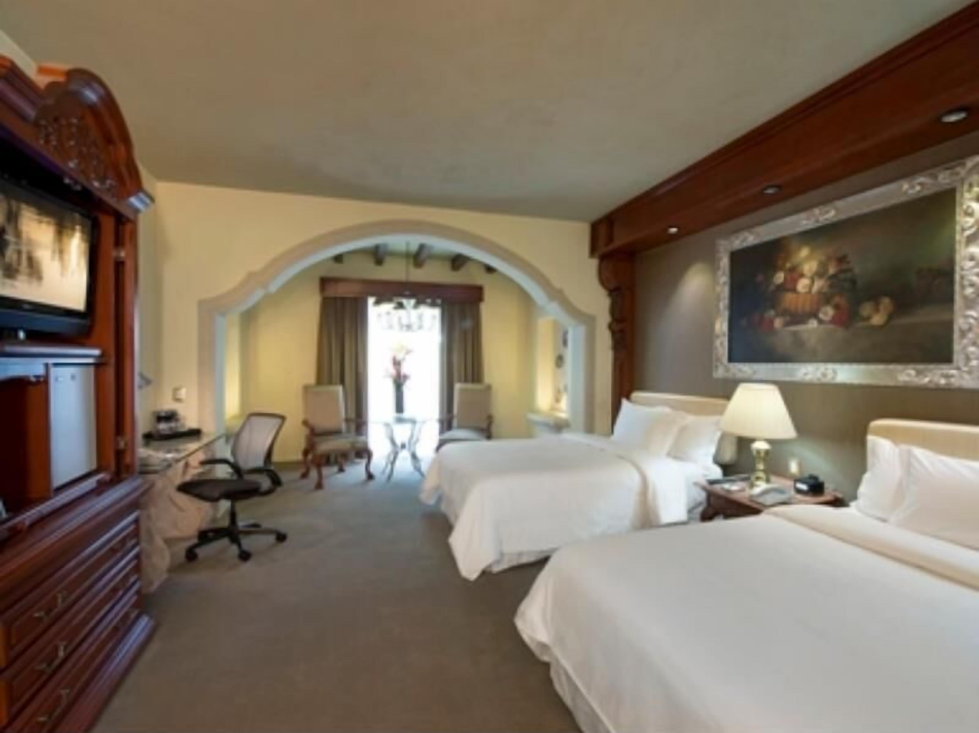 Premium bedding, in-room safe, individually decorated, blackout curtains