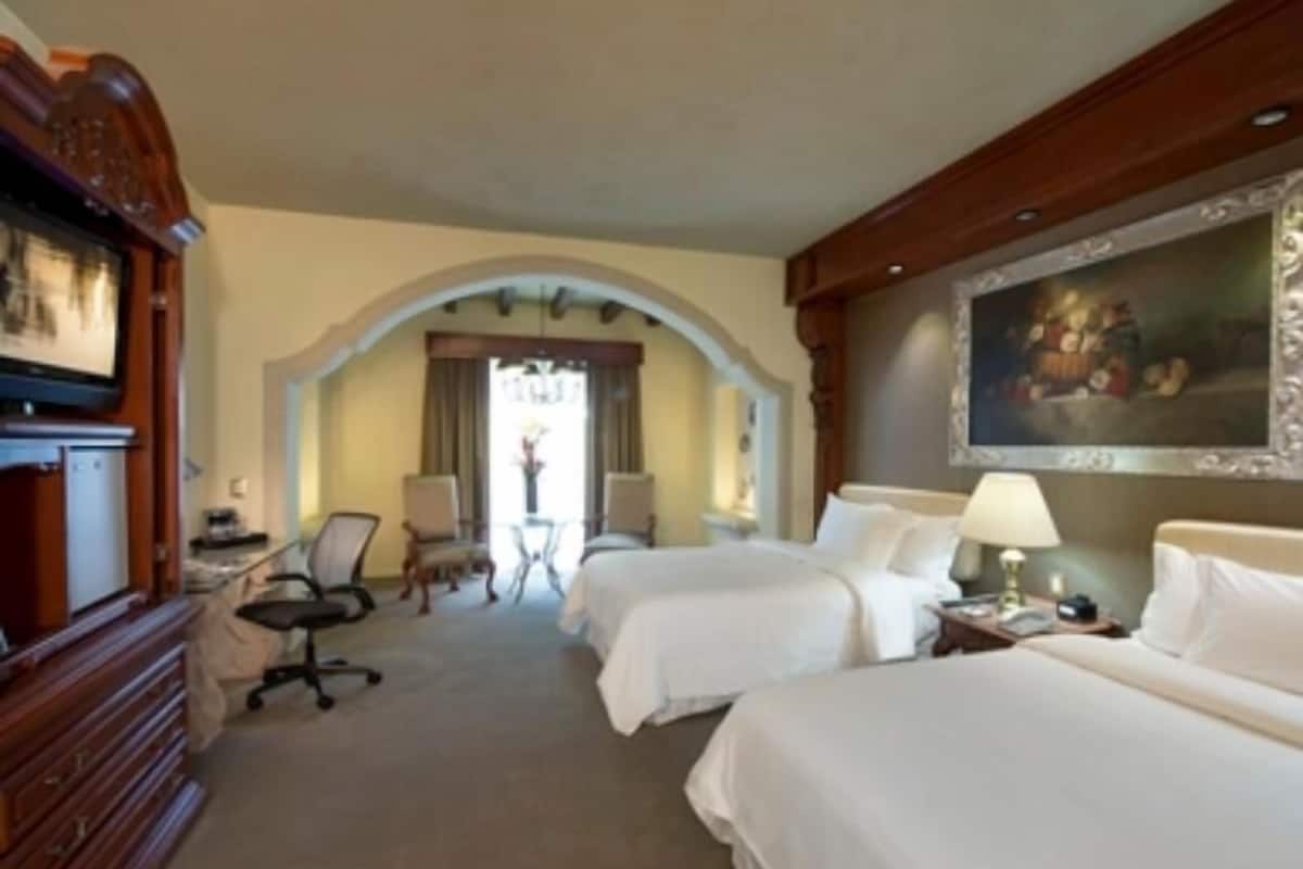 Premium bedding, in-room safe, individually decorated, blackout curtains