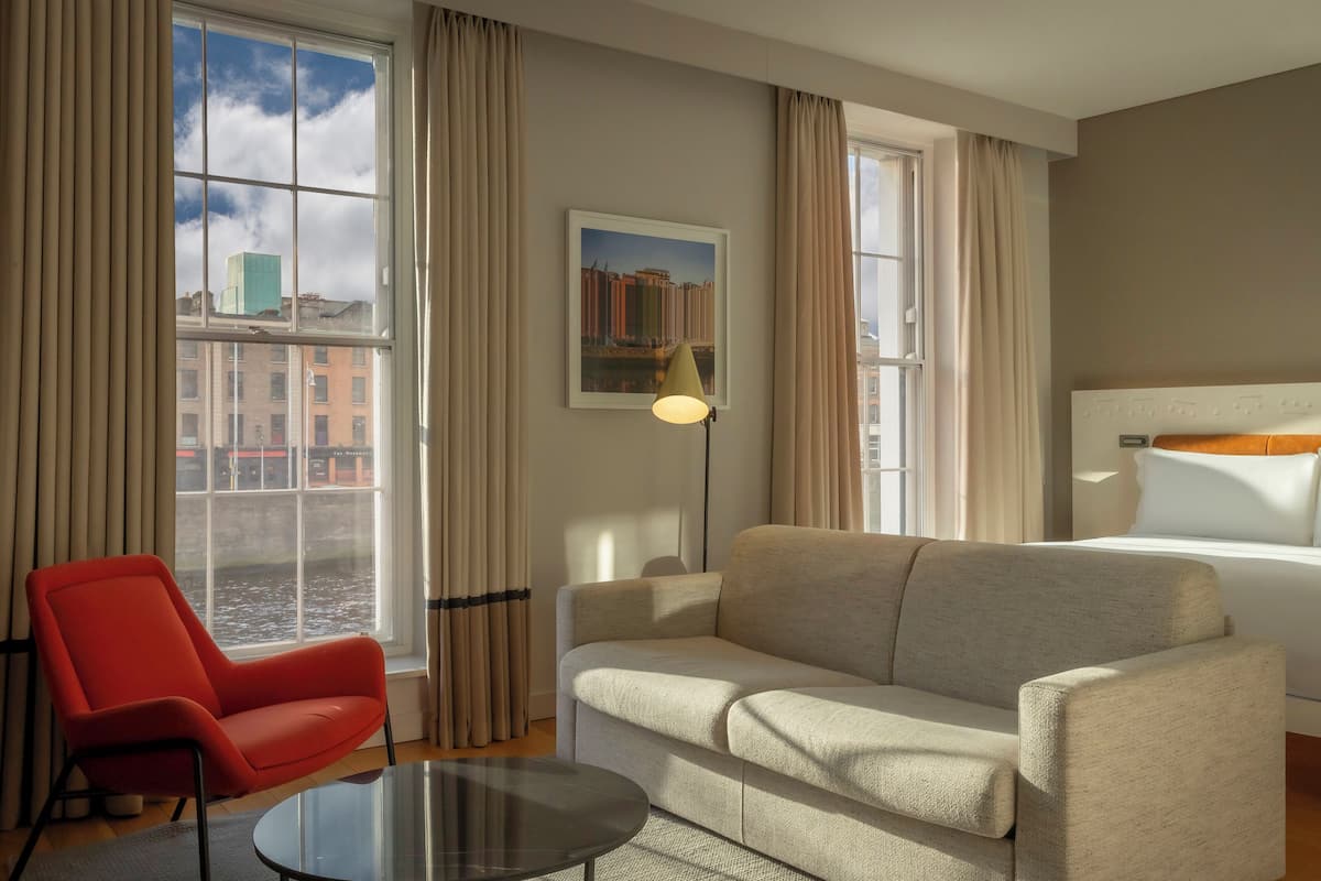 Junior Suite, 1 King Bed - River View | Hypo-allergenic bedding, in-room safe, desk, laptop workspace