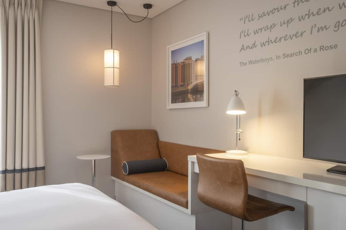 Hypo-allergenic bedding, in-room safe, desk, laptop workspace