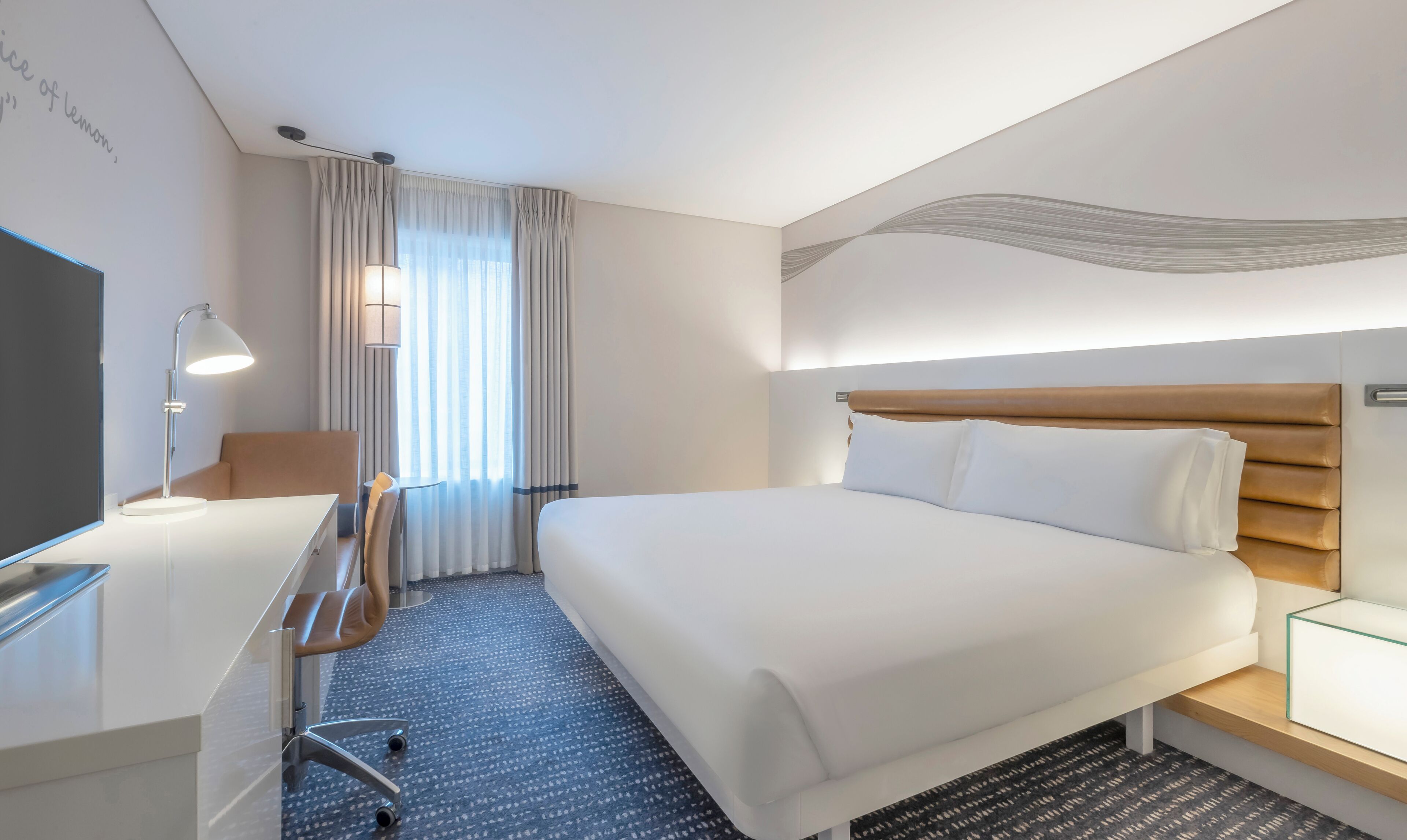 Hypo-allergenic bedding, in-room safe, desk, laptop workspace