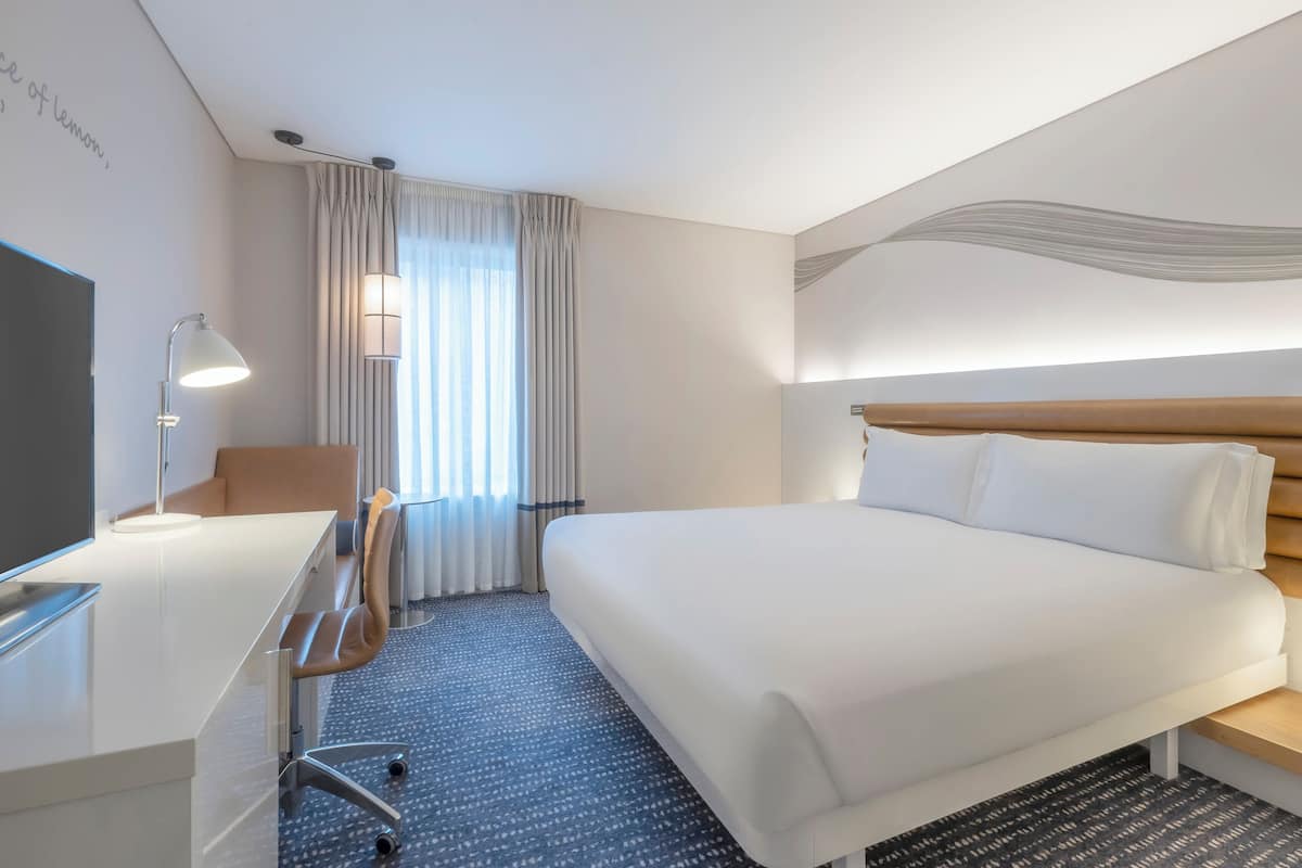 Hypo-allergenic bedding, in-room safe, desk, laptop workspace