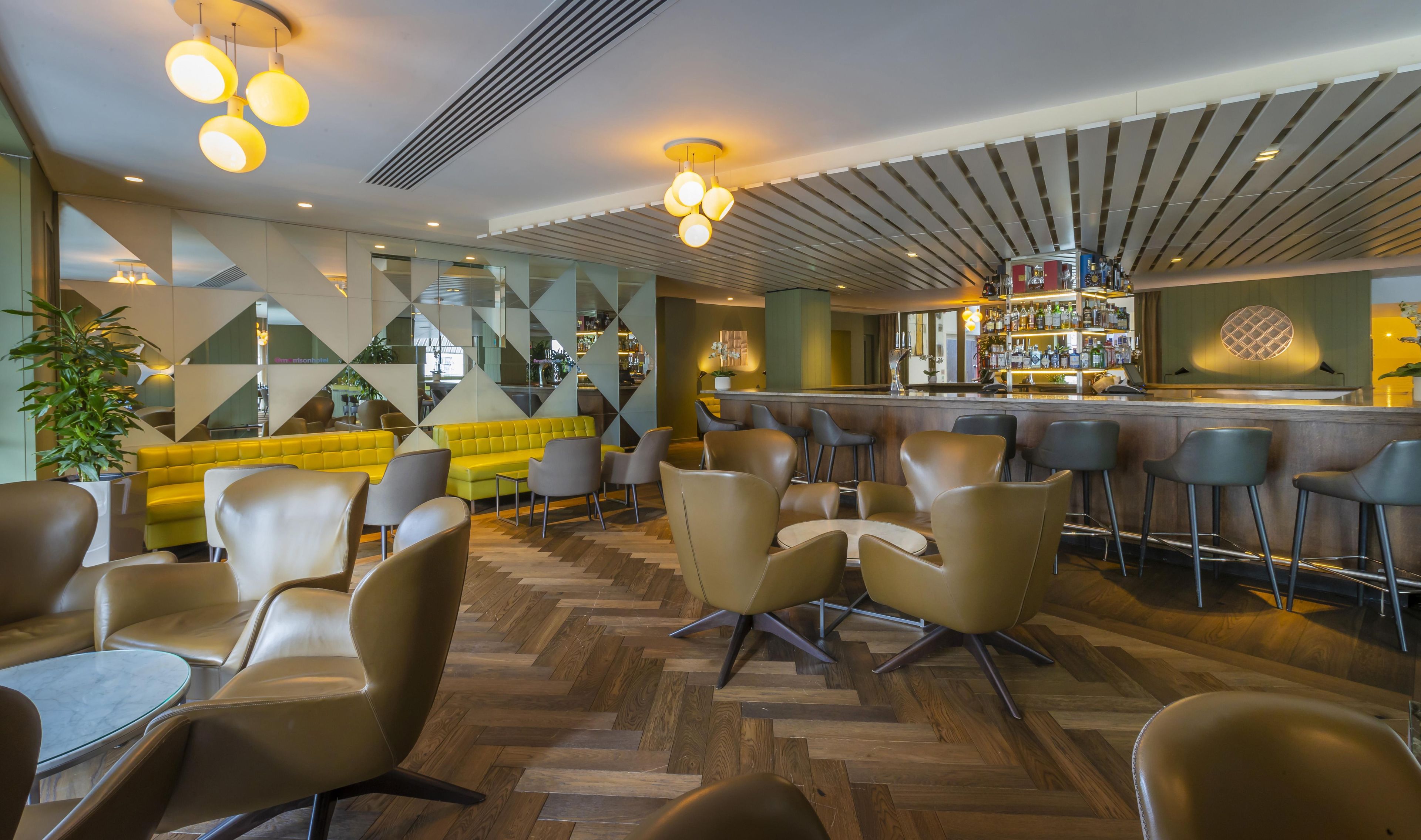 A bar area with seating and a bar counter.