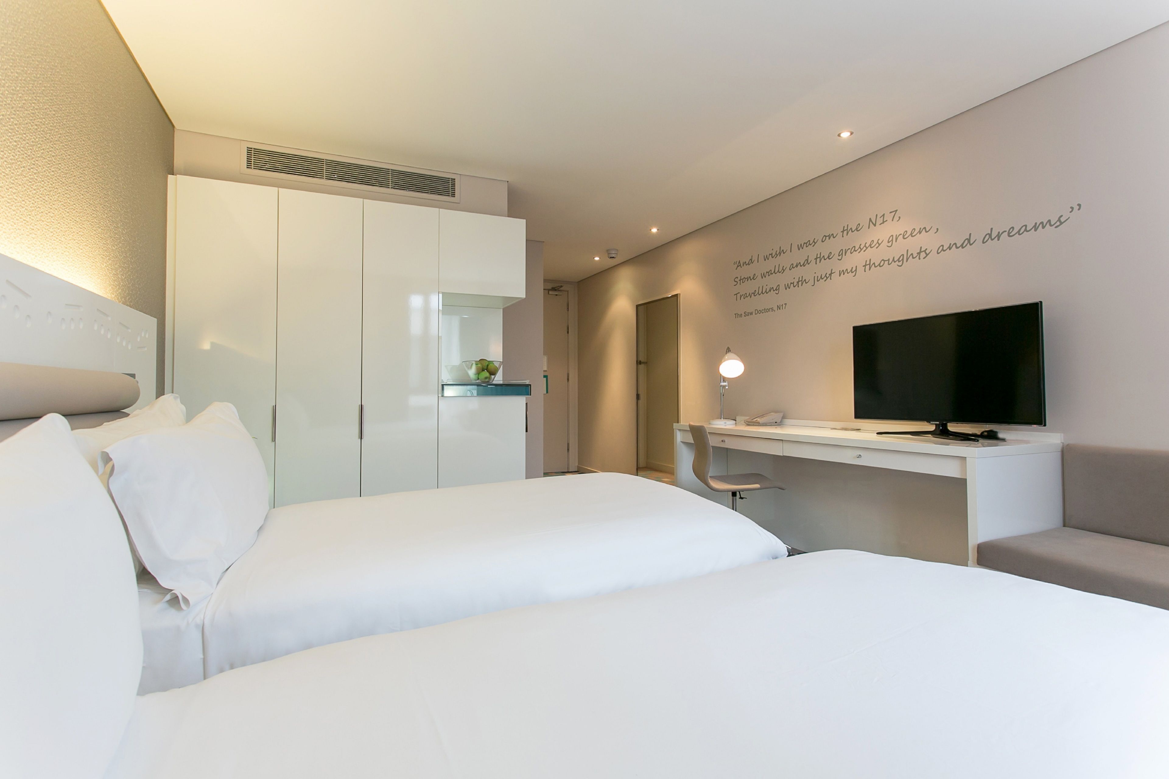 Hypo-allergenic bedding, in-room safe, desk, laptop workspace