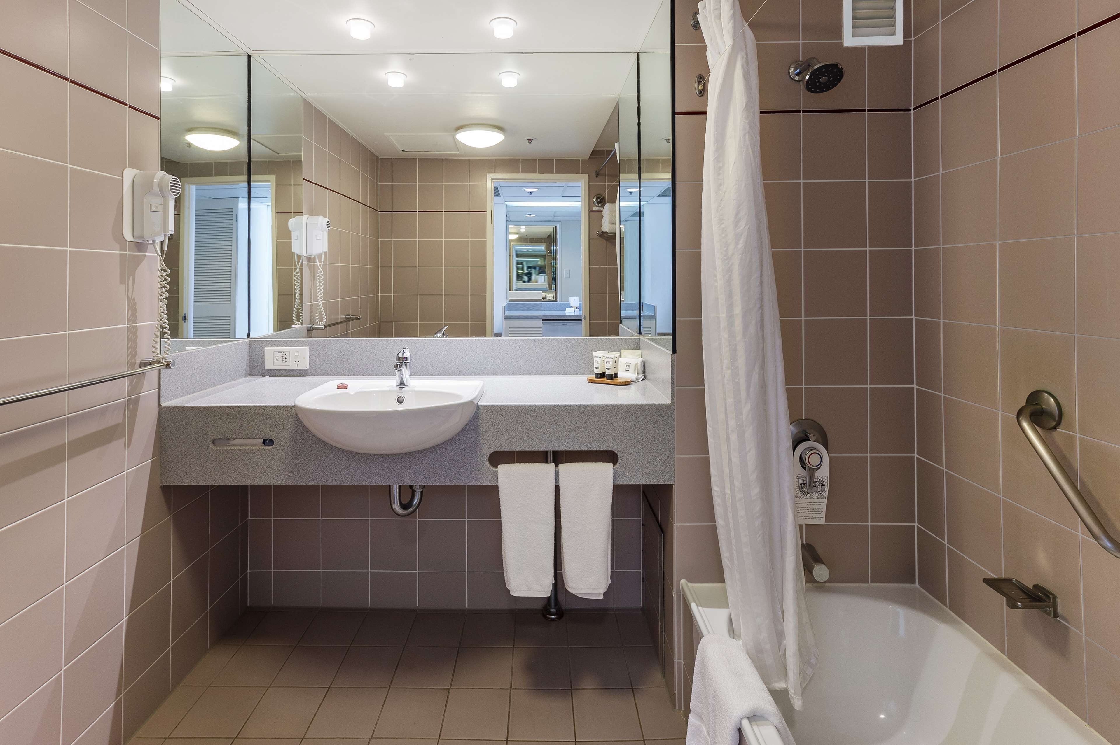 combined shower/bathtub, free toiletries, hair dryer, towels