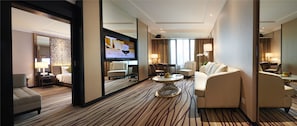 Executive Suite | In-room safe, desk, laptop workspace, iron/ironing board