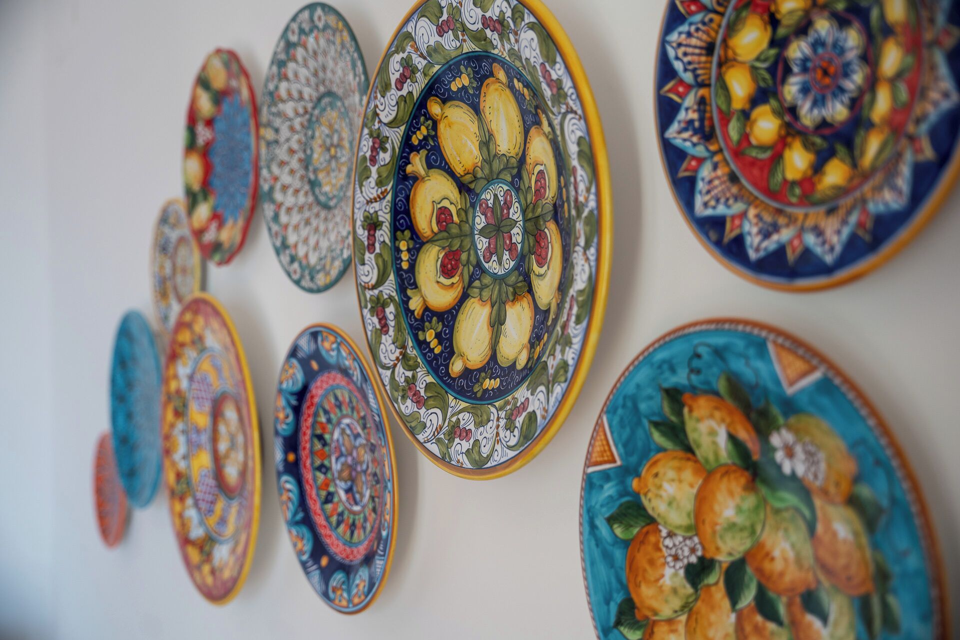 A collection of decorative plates with intricate designs and patterns.