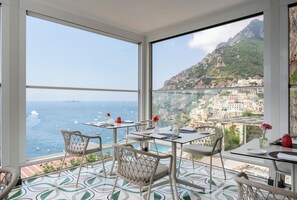 Breakfast, lunch, dinner served; pool views