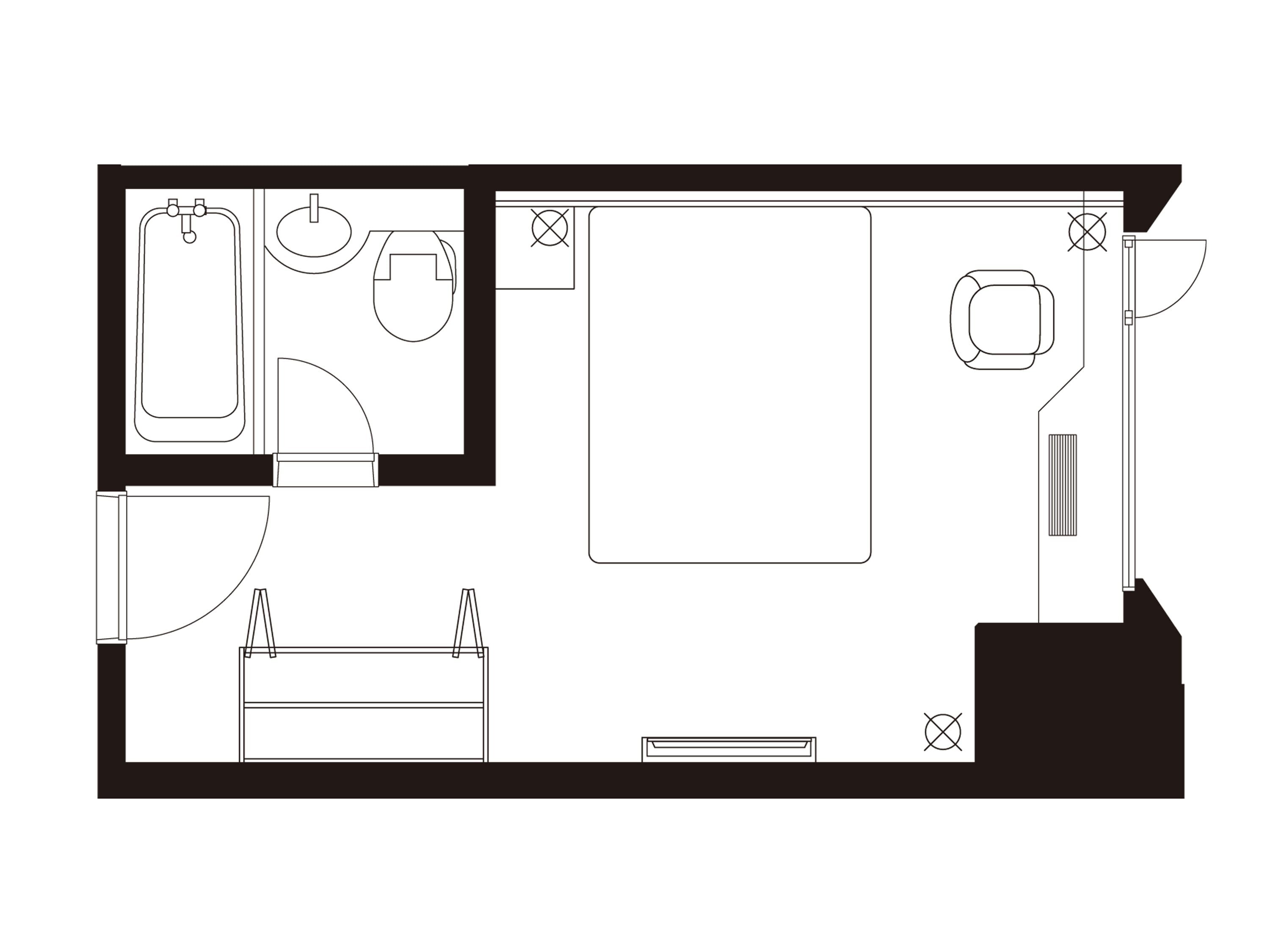 A floor plan of a hotel room with a bathroom, a bed, a desk, and a chair.