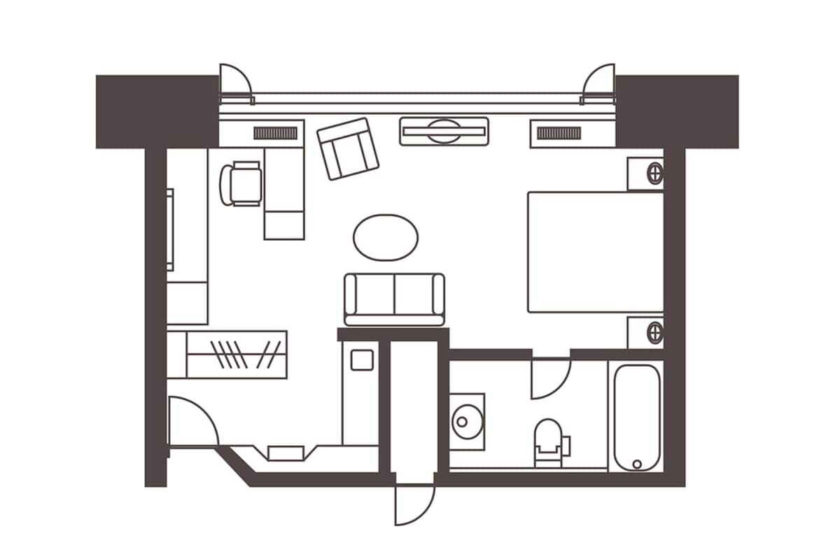 Deluxe-rum - 1 kingsize-säng - icke-rökare - hörn (with Lounge Access, Junior Suite) | Duntäcken, värdeförvaringsskåp på rummet och mörkläggningsgardiner
