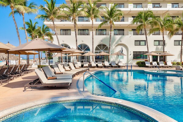 2 outdoor pools, pool umbrellas, sun loungers