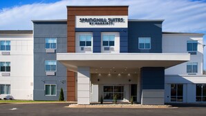 A modern hotel with a sign reading "Springhill Suites by Marriott." It features a two-story structure with a flat roof and a covered entrance. - Springhill Suites Marriott Little Rock West (Little Rock)