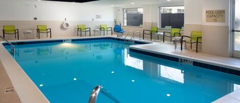 Indoor pool, open 6:00 AM to 10:00 PM, pool loungers