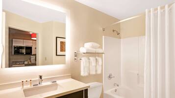 Combined shower/bathtub, hair dryer, towels, soap