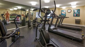 A gym with treadmills, ellipticals, and weight machines. - MainStay Suites Detroit Farmington Hills (Farmington Hills)
