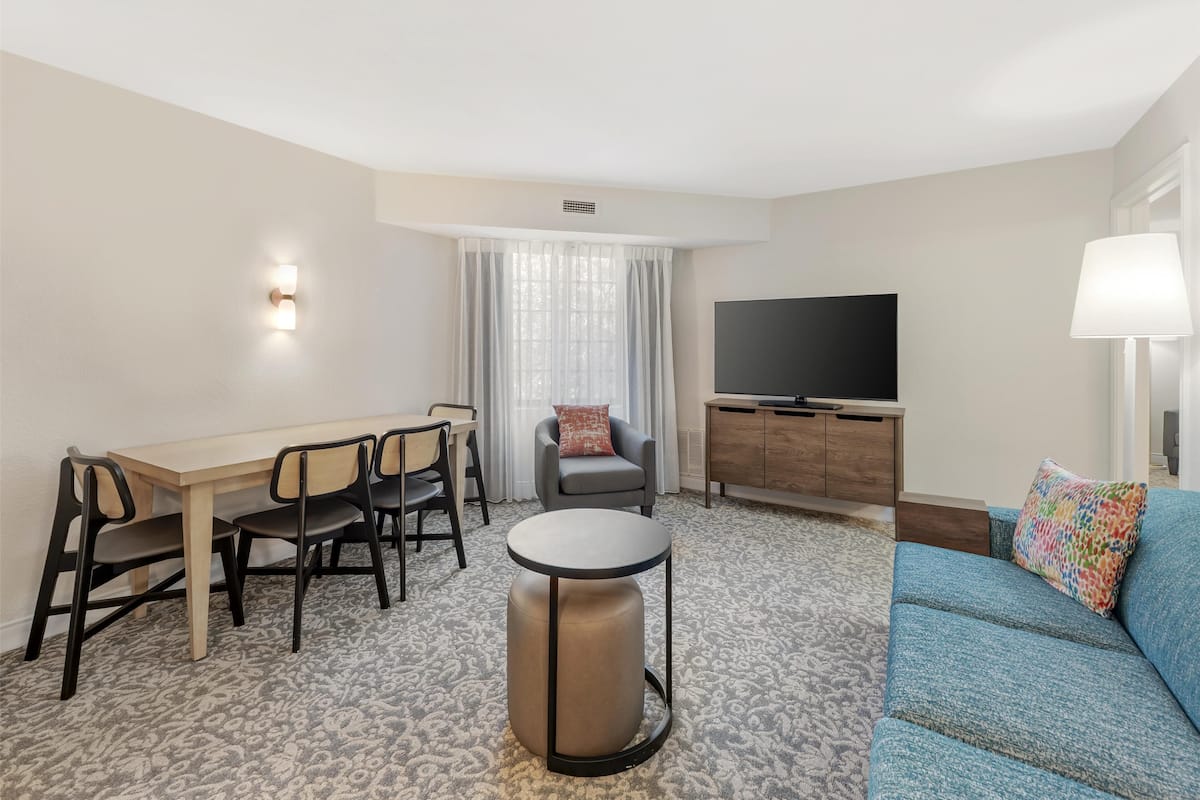 Suite, Multiple Beds (Two Bedroom King and Queen) | 2 bedrooms, desk, laptop workspace, iron/ironing board
