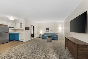 Suite, 1 Queen Bed with Sofa bed (One Bedroom) | 2 bedrooms, desk, laptop workspace, iron/ironing board
