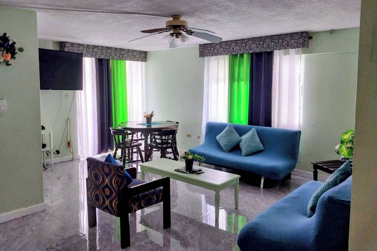 Family Condo, Multiple Beds, Accessible, Partial Ocean View with balcony | Living area | 50-inch LED TV with cable channels, TV