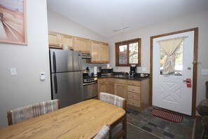 King One Bedroom Cabin | Private kitchen | Fridge, microwave, coffee/tea maker, cookware/dishes/utensils