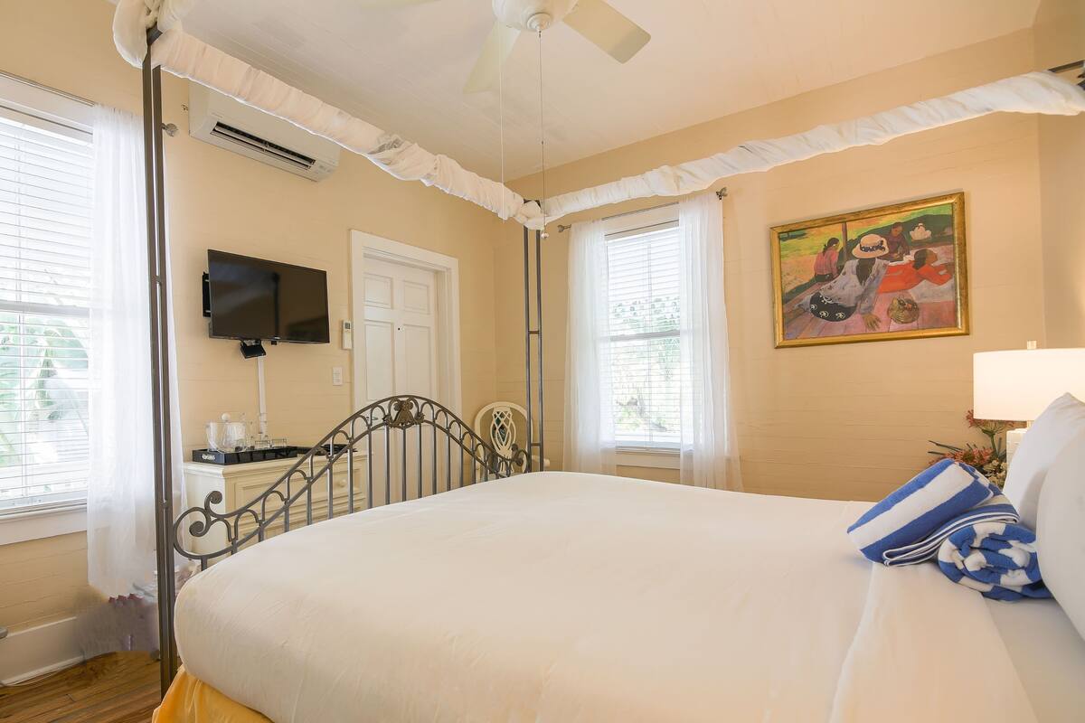 Suite, 1 King Bed - Honeymoon Suite 6 (2nd Floor, accessible via staircase) | In-room safe, iron/ironing board, WiFi (free), alarm clocks