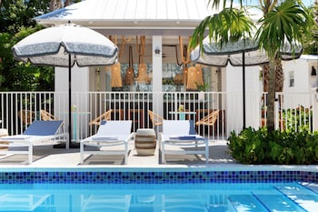 3 outdoor pools, open 7:00 AM to 10:00 PM, sun loungers at Winslows Bungalows - Key West Historic Inns