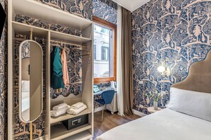 Standaard kamer | Luxe beddengoed, een minibar, een kluis op de kamer