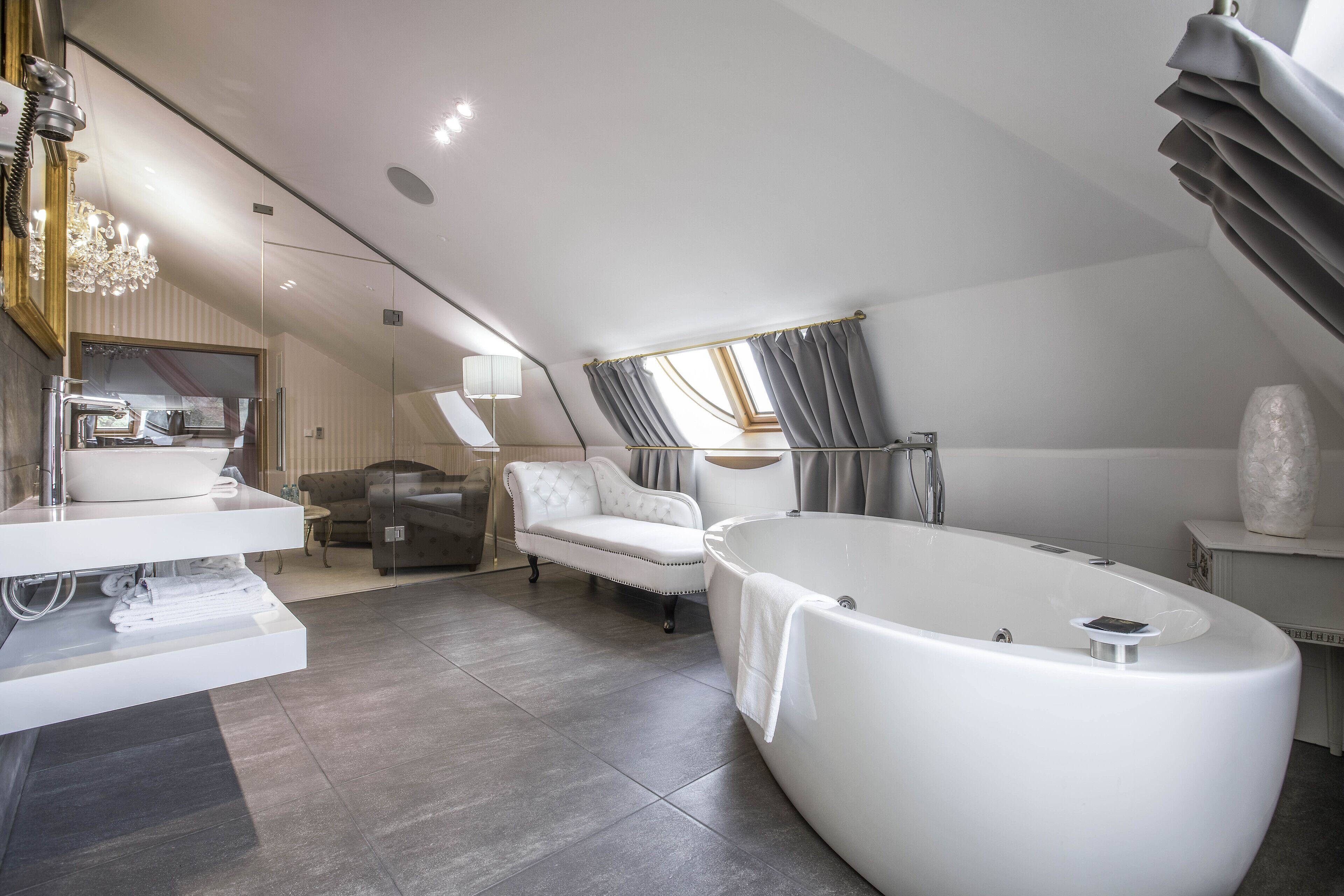 luxury suite, 1 bedroom | bathroom | combined shower/bathtub, designer toiletries, hair dryer, bathrobes