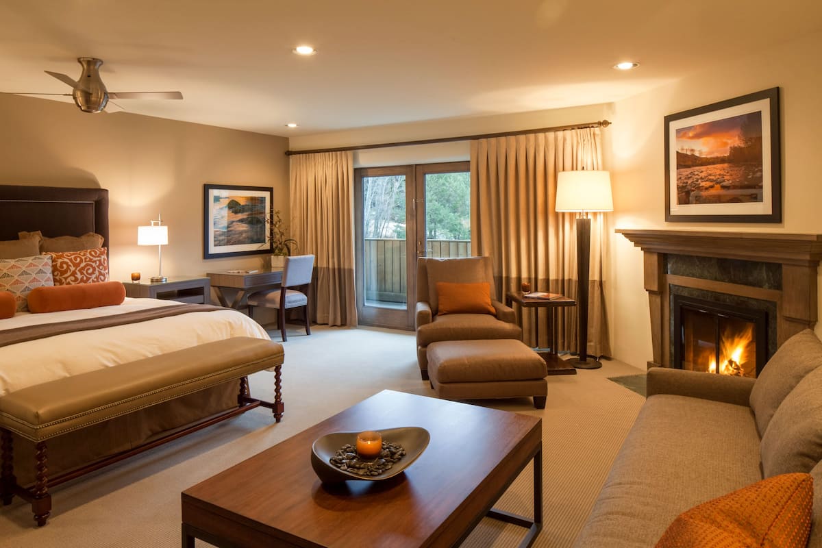 deluxe room, 1 king bed, fireplace | premium bedding, down duvets, in-room safe, desk