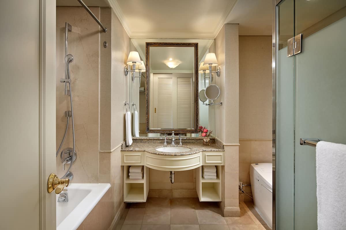 separate bathtub and shower, deep-soaking bathtub, hair dryer, bathrobes