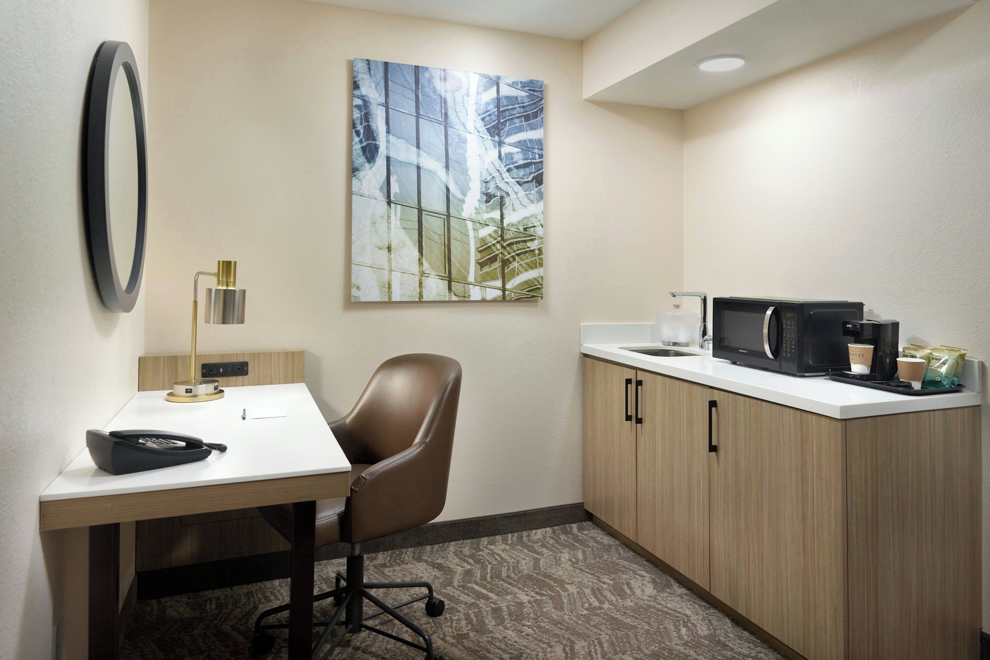 premium bedding, pillow-top beds, desk, blackout curtains