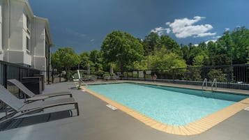 Seasonal outdoor pool, open 8:00 AM to 8:00 PM, pool umbrellas