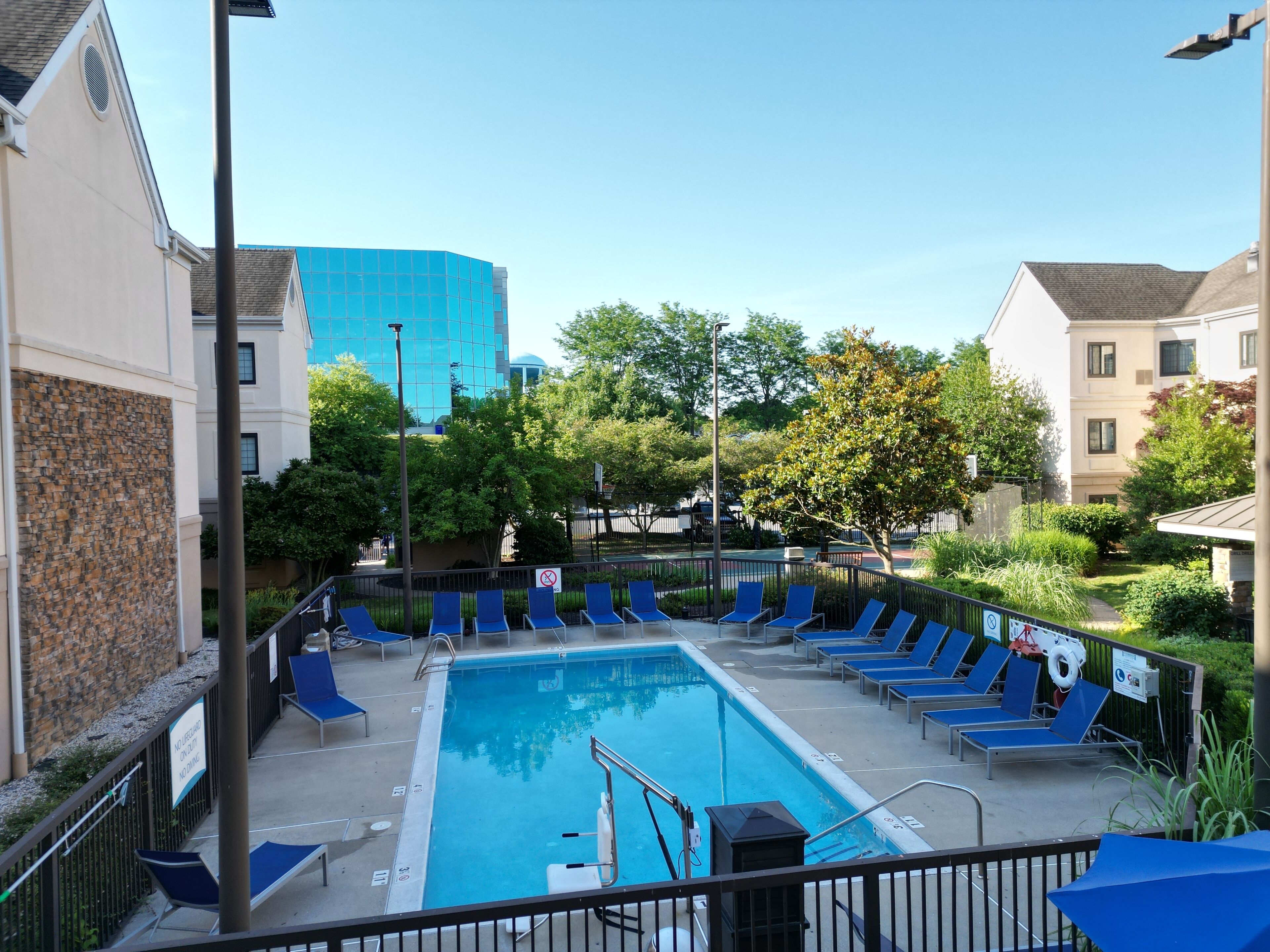 seasonal outdoor pool, open 11:00 am to 7:00 pm, pool umbrellas