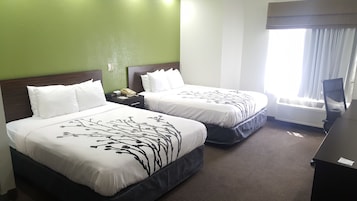 Quarto standard, 2 camas Queen, para não fumantes | Escrivaninha, ferros/tábuas de passar roupa, Wi-Fi de cortesia