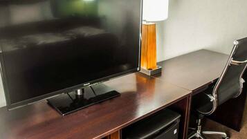 Desk, blackout drapes, iron/ironing board, free cribs/infant beds