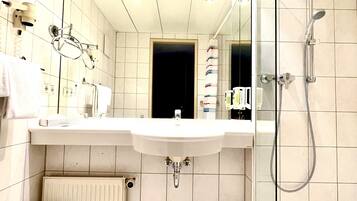 Eco-friendly toiletries, hair dryer, towels