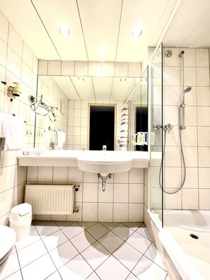 Eco-friendly toiletries, hair dryer, towels