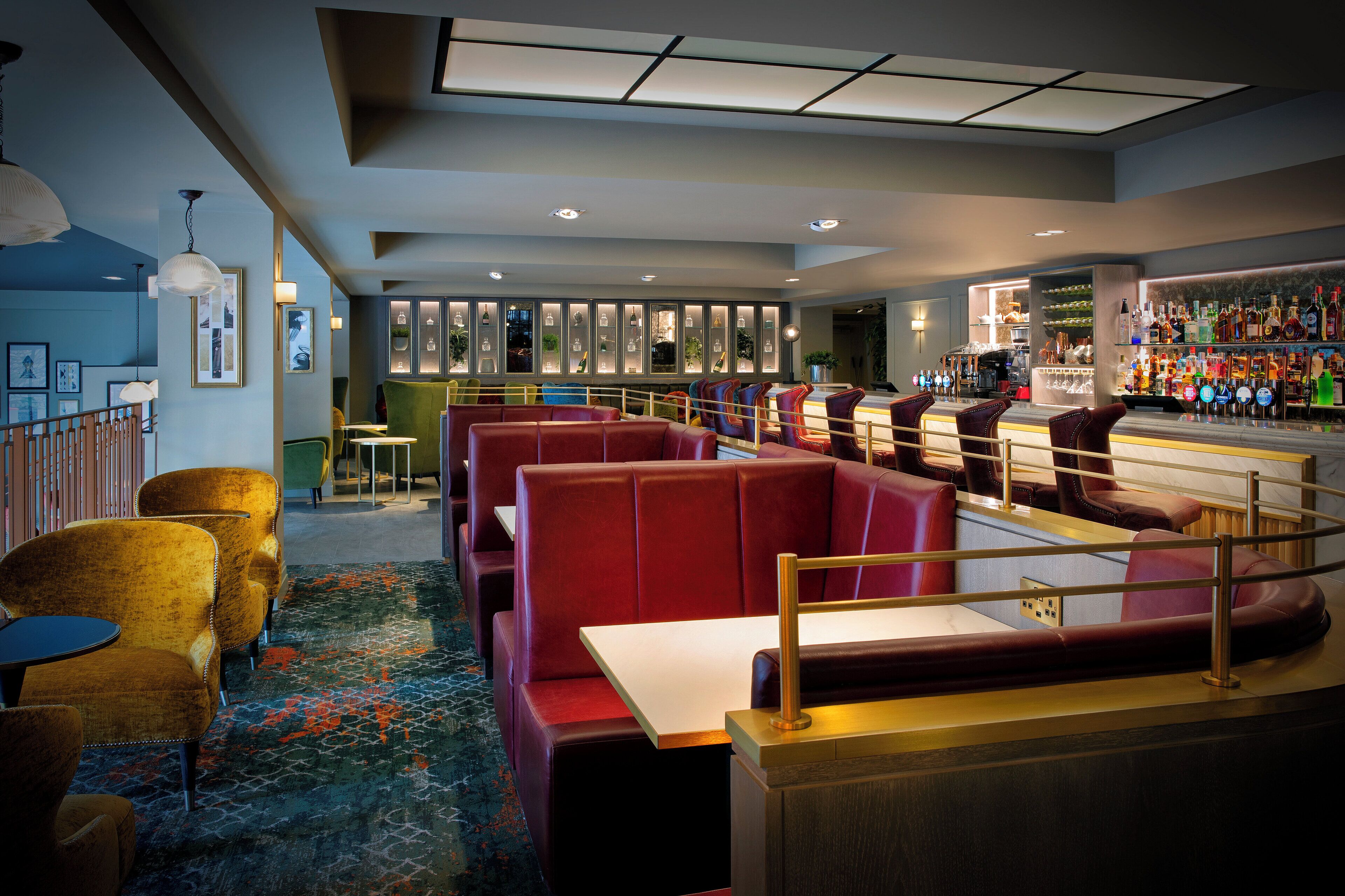A bar area with seating and a bar counter.