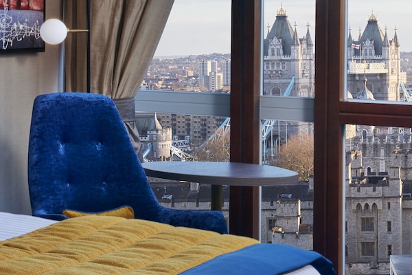 Luxe beddengoed, een kluis op de kamer, een bureau