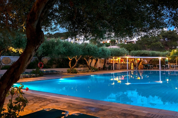 Seasonal outdoor pool, pool umbrellas, sun loungers