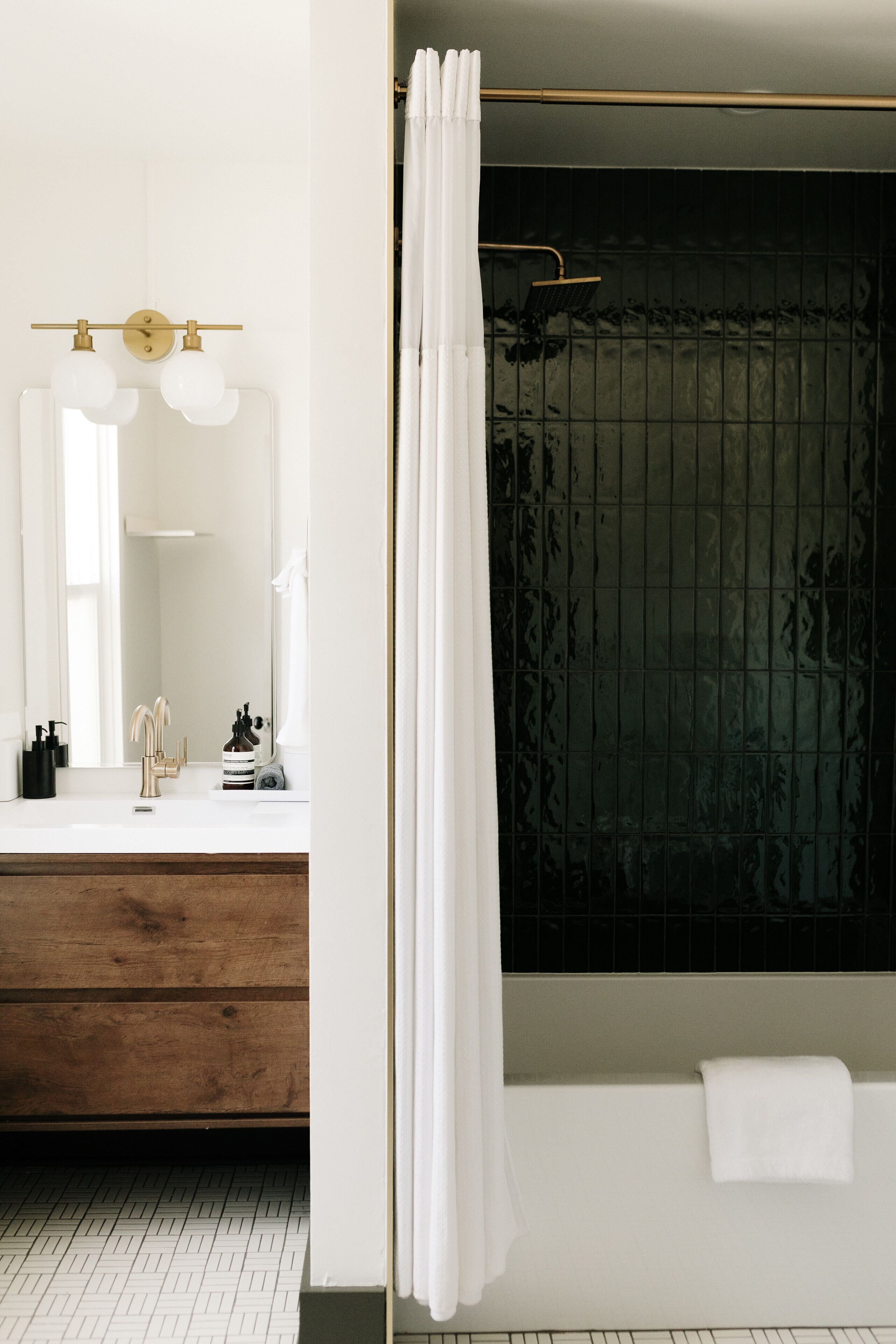 designer toiletries, hair dryer, towels