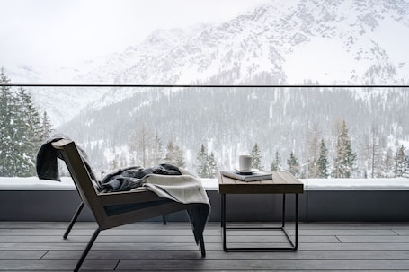 Two-Bedroom Mountain Loft | View from room. Tschuggen Grand Hotel