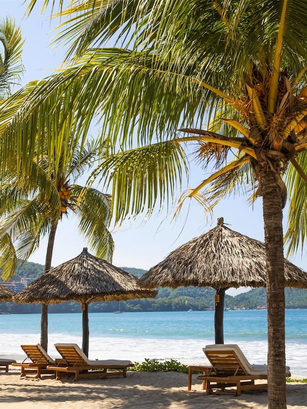 On the beach, sun loungers, beach towels