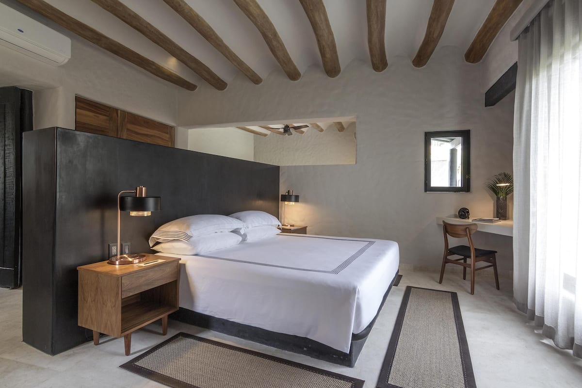 Suite, vue lagon (Plunge Pool) | 1 chambre, literie de qualité supérieure, minibar