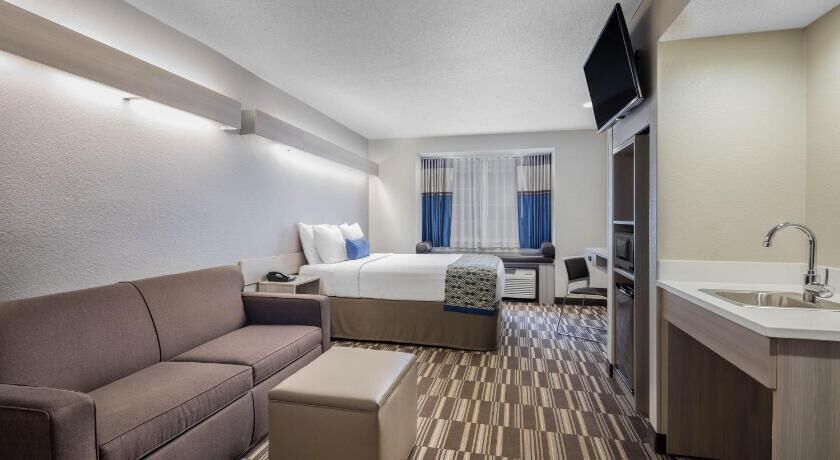 Pillowtop beds, desk, laptop workspace, blackout drapes
