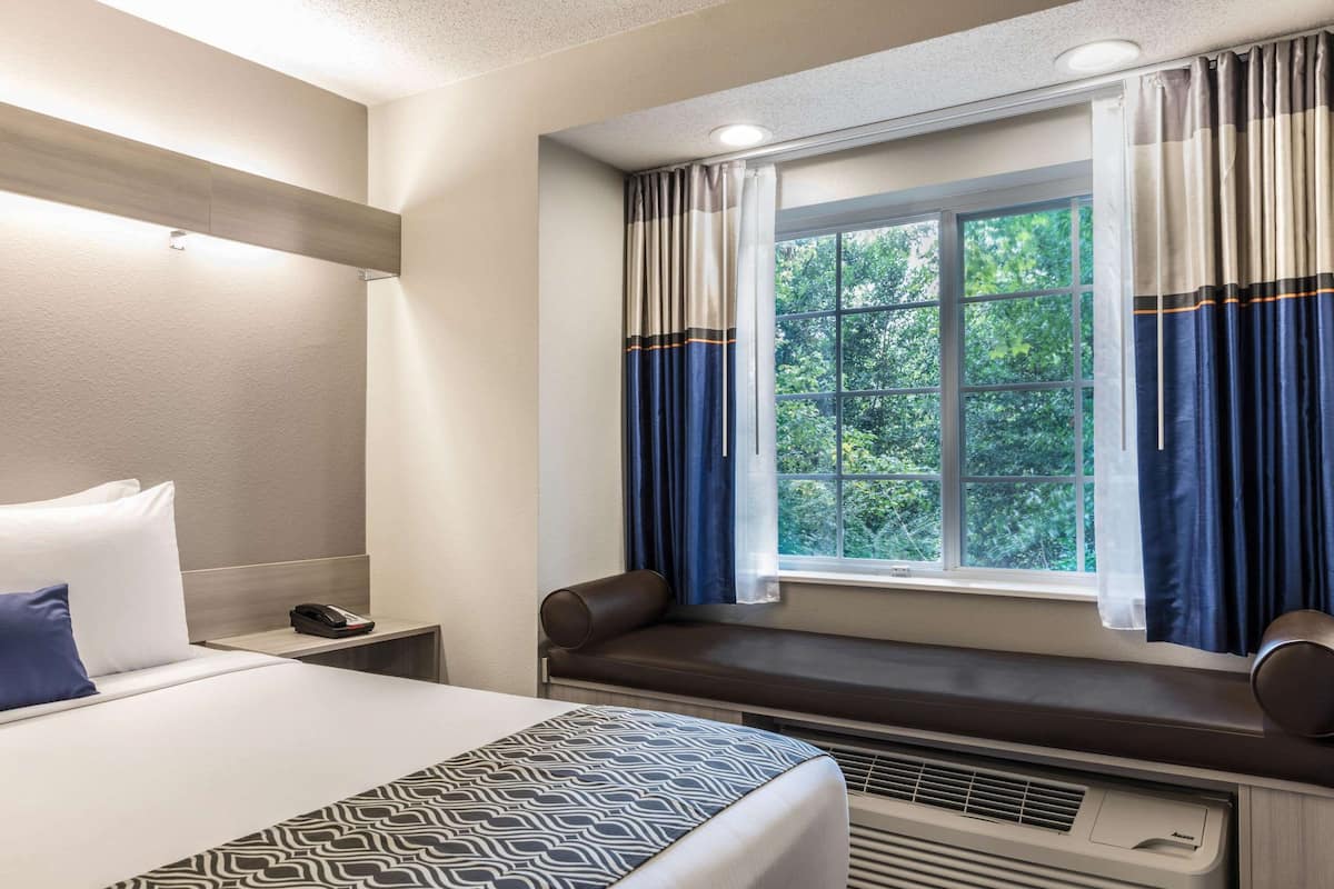 Pillow-top beds, desk, laptop workspace, blackout curtains