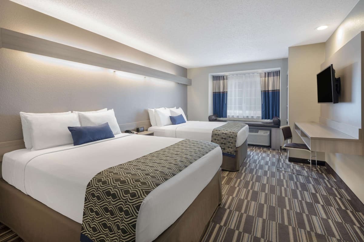 Pillow-top beds, desk, laptop workspace, blackout curtains