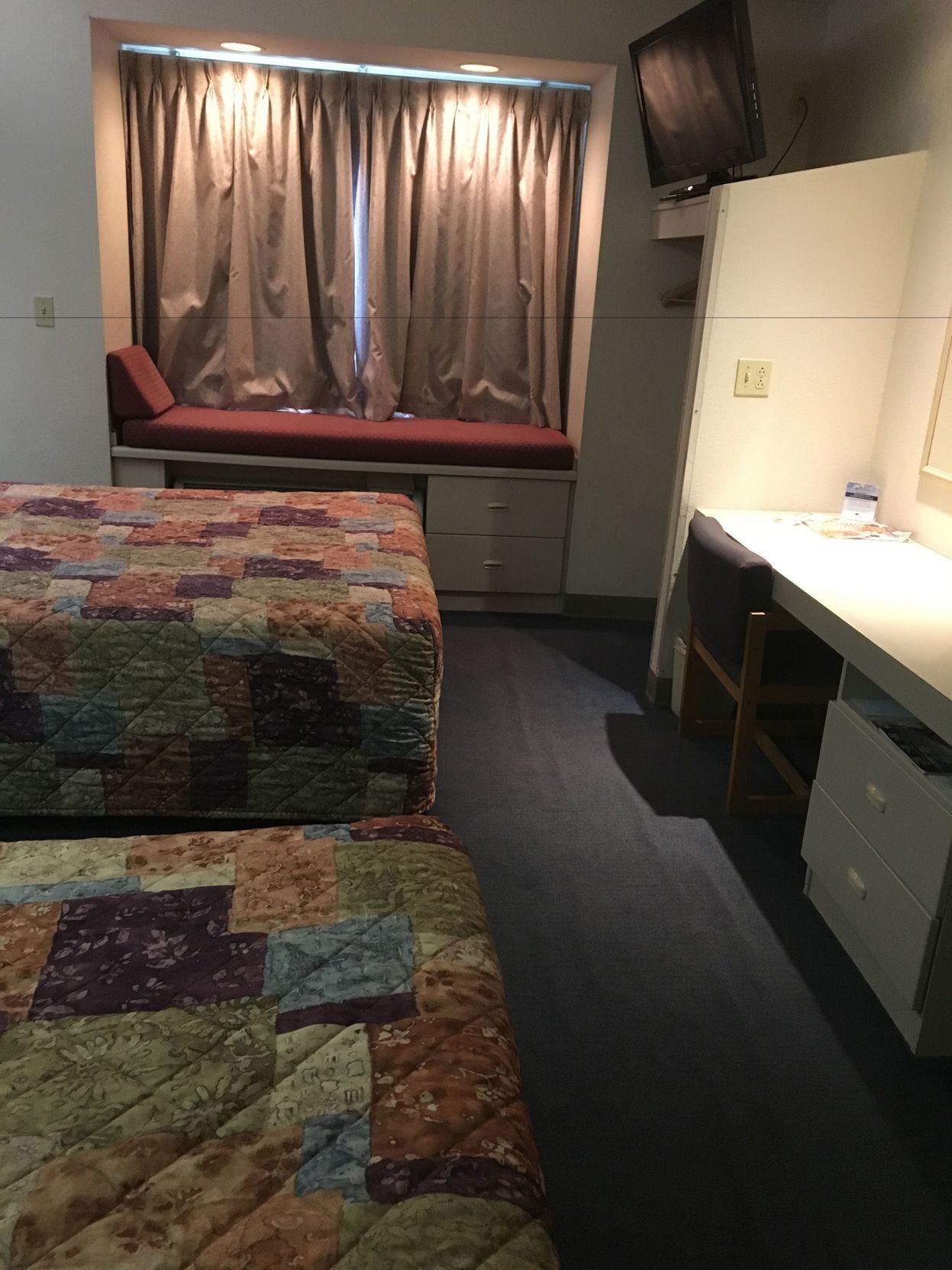 Desk, laptop workspace, blackout curtains, free WiFi