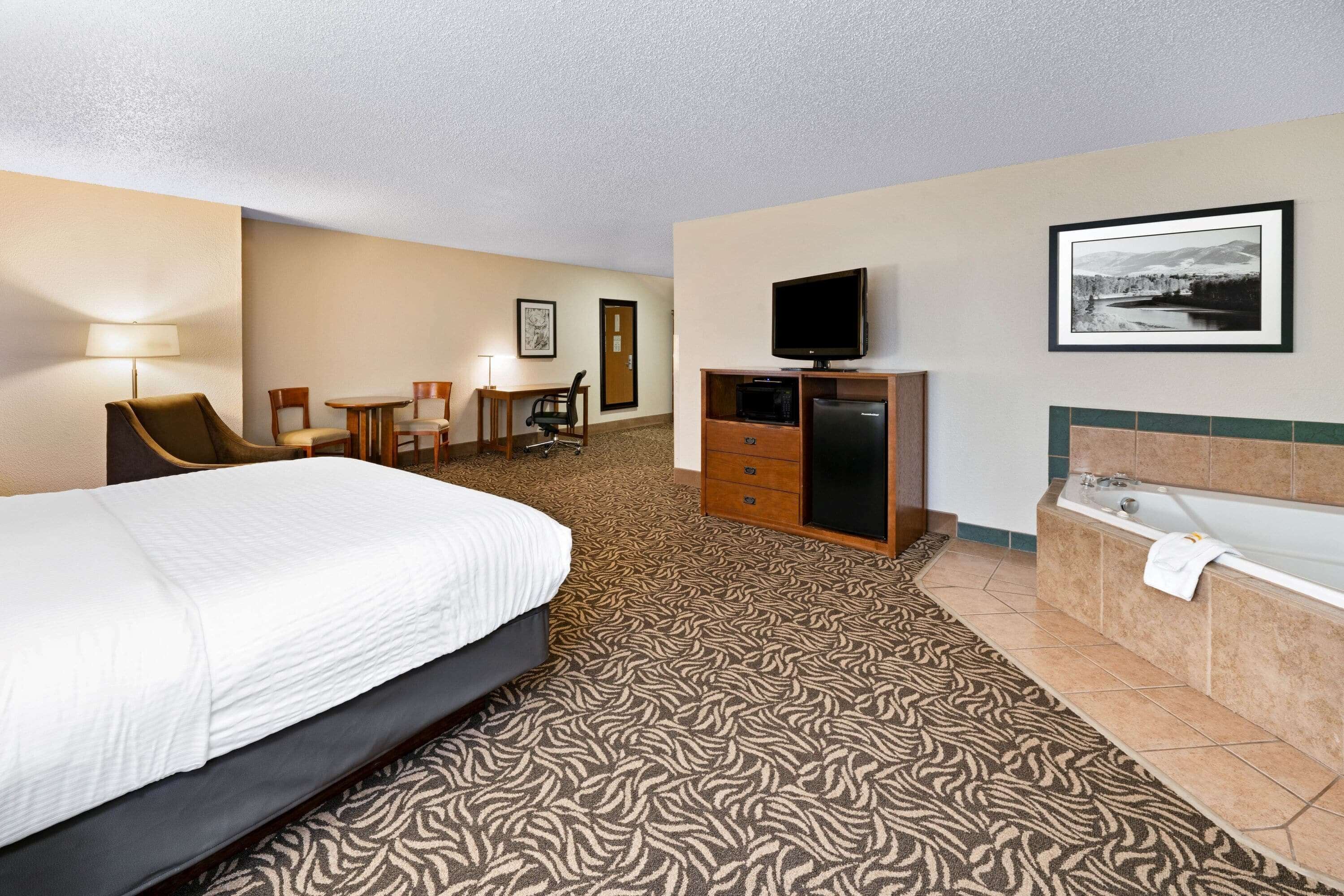 suite, 1 king bed, non smoking (creek view) | premium bedding, in-room safe, desk, blackout curtains